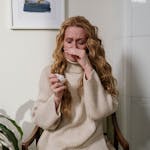 Woman Suffering From Her Allergy